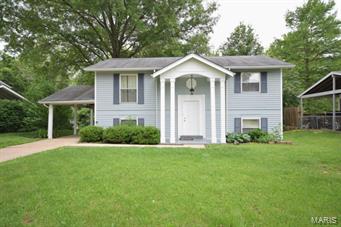 Wonderful value for the price!  Four bedroom two bath split with large back yard.  Updated kitchen with pantry, dishwasher, and mounted microwave.  Large living room and two bedrooms on the upper level.  Family room, some storage,  and bedrooms three and four on the lower level.   Backyard backs to trees and home has a deck.  Front of the house has been freshly painted and is quite striking from the street.  The location offers ideal access to the Page Extension as well as various amenities.  Seller would like about a 45 day closing if possible.