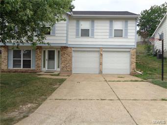 Beautiful raised ranch home in the High Ridge area.  This home has a 2 car garage and over 1600 sq feet of living space.  NEWER ROOF, down spouts and gutters were replaced in September 2016. The 6 panel doors added in September 2016 give the home new and updated look.  Both bathrooms were remodeled in November of 2016 with gorgeous white marble that is to die for.  Foundation wall water-proofed and French drain installed in 2009.  New attic fan installed in 2010 and attic insulation added in 2011 makes the home much more energy efficient, and cuts down the cost of utilities.  Adorable ceiling fans in all bedrooms.  The downstairs has a cozy family room with a gas fireplace that the current owner had the gas company cap off.  The downstairs also has a full bathroom, laundry room and an bonus room that could be a great office.  Home is handicap accessible, including a stair lift.