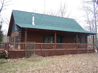 Just in time for your summer enjoyment a beautiful log home in the Mark Twain Lake area ready for your family fun. Located on small lake with 10'x14' dock and your own paddle boat.