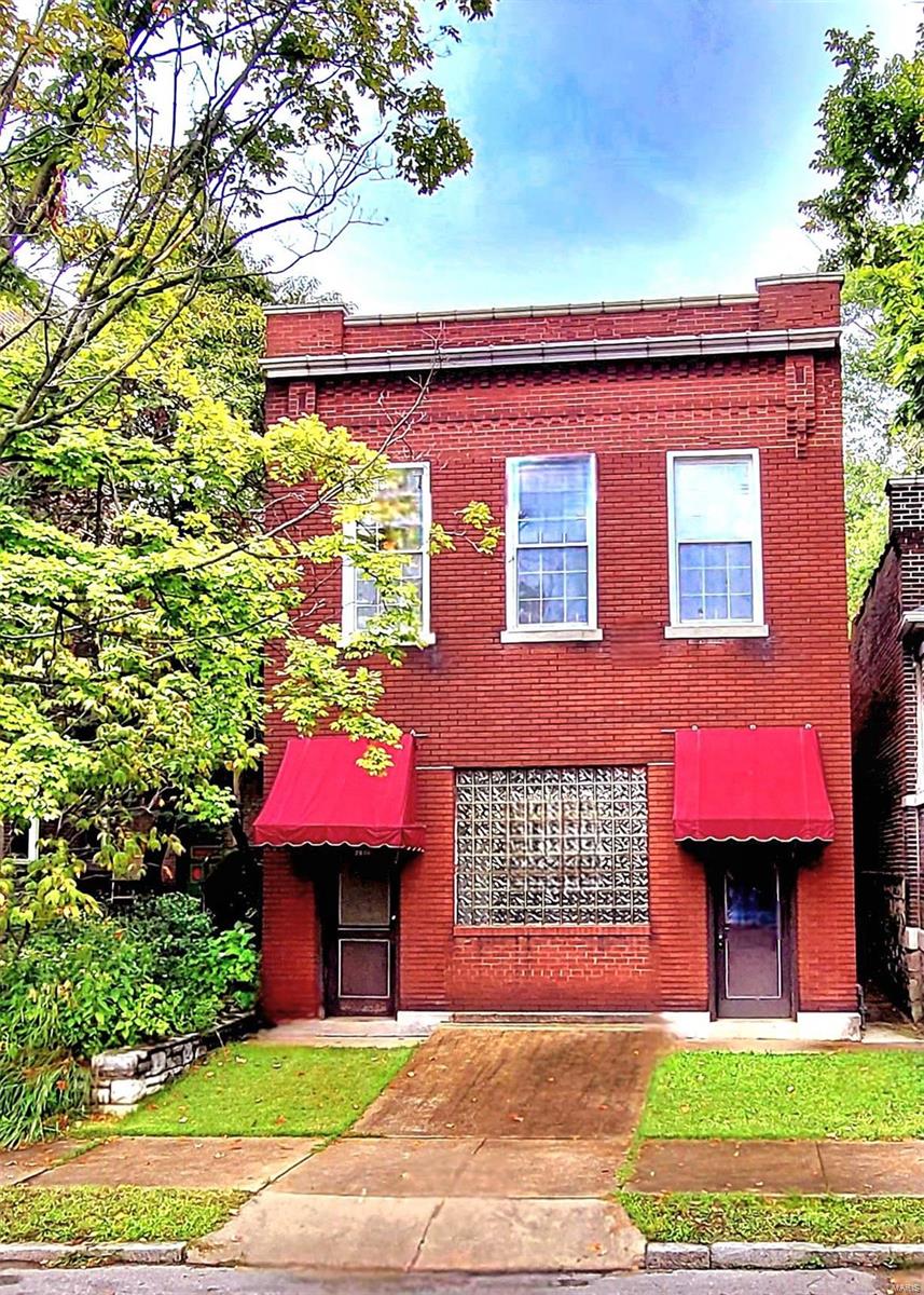 The ultimate man cave has been found. This property's potential is limitless! Massive 2-story mixed-use building contains 4,311+/-sf and includes a ground-floor garage ideal for warehouse, vehicle storage, workshop, etc. Used as maintenance garage and storage of classic cars the last 35+ years. Sliding garage door accessible from the alley. Front glass blocks can be removed and converted back into the 2nd drive-in door (existing concrete ramp already installed). 2nd floor apartment is ready for a complete makeover, with original architectural details including hardwood floors, pocket doors, tons of natural light, and vintage built-ins. The unfinished 2nd floor area in the rear could be converted into a separate studio apartment or connected to front apartment with a deck or enclosed for additional living space. Potential to build-out 4 individual apartments. Ideal for someone looking to restore a piece of history while capitalizing on a prime location in Tower Grove East neighborhood. Additional Rooms: Sun Room