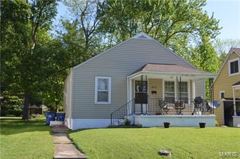 3 bedroom home in great location just across the street from the park! Hardwood floors in the dining room, living room, hall and all the bedrooms. Updated bath with ceramic tile shower. Great kitchen with smooth top stove and ceramic tile floor. Ceiling fans in all rooms and step in closets in the bedrooms. Large level back yard for the kids to play and access to the alley behind.