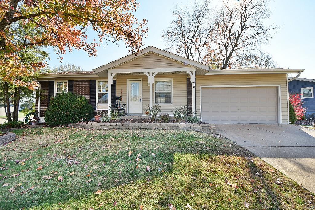Resting upon a lovely level corner lot in a peaceful subdivision you'll absolutely love to come home to, this terrific 3 bed/2 bath brick-front ranch is just what you've been searching for. You'll be greeted with a lovely covered front porch inviting you to step inside the wide open living spaces of the large living room & eat-in kitchen where you'll find beautiful custom cabinetry, decorative tile backsplash & stainless appliances. The main floor bath has also been updated & includes a solid surface vanity top + ceramic tile flooring & shower surround. Your functional living space is tremendously expanded with the finished lower level adding wonderful family room with toasty brick-surrounded fireplace + an adjacent sitting room, recreation room, den & 2nd full bath. Ultra-convenient 2-car attached garage & additional off-street parking assure that coming home is always a breeze. Treat yourself with an Appointment to view this one Today!