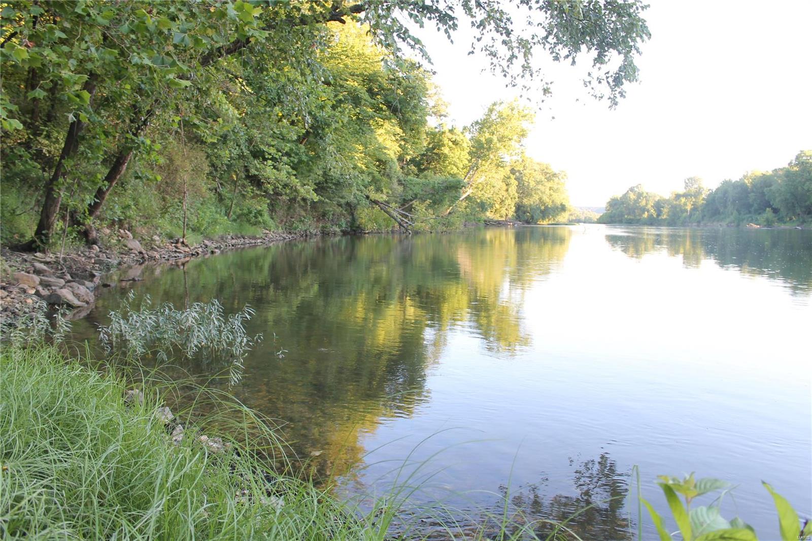 389 +/- acres between Vienna and Rolla. It is HARD TO FIND RIVER PROPERTY like this. Country Home, Hobby Farm, Cattle Ranch or weekend get-a-way. Wide diversity of habitat for deer, turkey and fishing and occasional black bear. Awesome Deer and Turkey Hunting, trophy bucks from this and adjoining properties. 1/4 mile of frontage on GASCONADE RIVER great smallmouth bass fishing, fishing pong next to house and 3 other ponds. Clean updated 3 BR, 1 BA ranch style house with multiple outbuildings. 40% open with good roads and trails through property. Great food plot locations throughout most of the property. Campsite at river with electric hook up, just across river from Bell Chute Public access. Some fencing with current cattle grazing on front fields. 20 minutes north of Rolla.