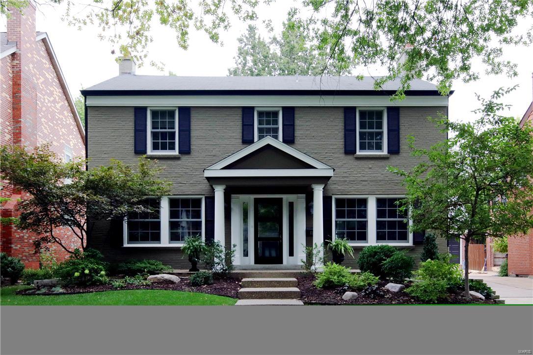 No show until Sunday Open House. Updated and transformed by the present owner, this beautiful Clayton Gardens home is perfectly designed for today's lifestyle. Impeccable attention to detail and crown molding throughout, formal Living and Dining Rooms, fully appointed Butler's Pantry, open Kitchen/Hearth Room with custom cabinetry, granite counters, top-of the line appliances, built in bookcases, fireplace, Sunroom with windows on 3 sides and French doors that open to an aggregate patio with water feature & charming professionally landscaped yard creating a great floor plan for entertaining.  Large light filled Master Suite, two walk-in closets and spa like Master Bath, double vanity, marble counters, separate tub and shower.  Two additional bedrooms and Jack-n-Jill bath, Laundry complete the 2nd floor.  Rec room, 1/2 bath & additional laundry area,tons of storage in the LL.Two car detached garage. Located within walking distance of your favorite restaurants, Clayton Center & Straub's.