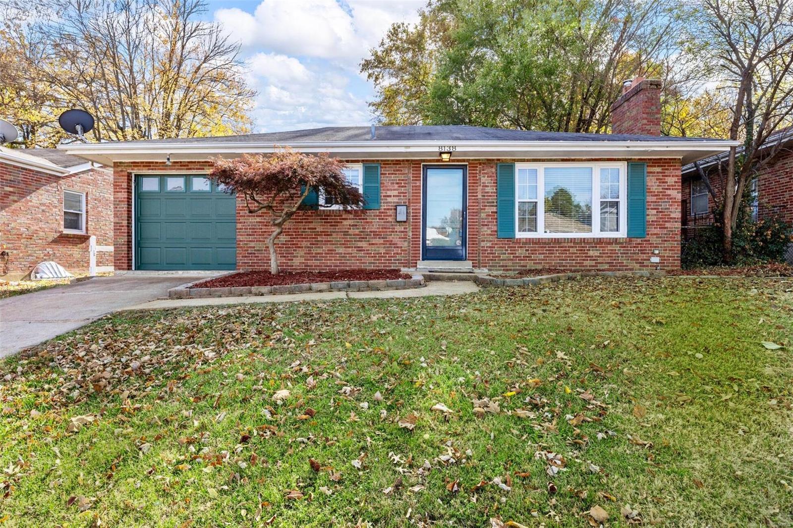 HUGE PRICE REDUCTION! Last chance before sellers turn it into great rental income! This adorable, full brick bungalow is move-in ready!! A 2 bedroom and 1 bath that features beautiful hardwood floors, crown molding, glass block windows, and large picture window. The eat-in kitchen has white cabinetry, pantry and walks out to a covered porch perfect for a porch swing. The hall bath includes a Bath Fitter (lifetime warranty) tub/shower combo and  pedestal sink. The lower level has a recreation/family area and 2nd room that can be used as a sleeping area, playroom or office. Also, there is a laundry room with plenty of storage space. Enjoy extra storage in the one car garage with service door opening to a fully fenced, large, private backyard with a cute shed and spacious patio. Fridge, washer and dryer stay. HVAC and all windows have been replaced in this seller's ownership. A wonderful neighborhood near walking paths, great parks and the Nationally Recognized Brentwood School District.