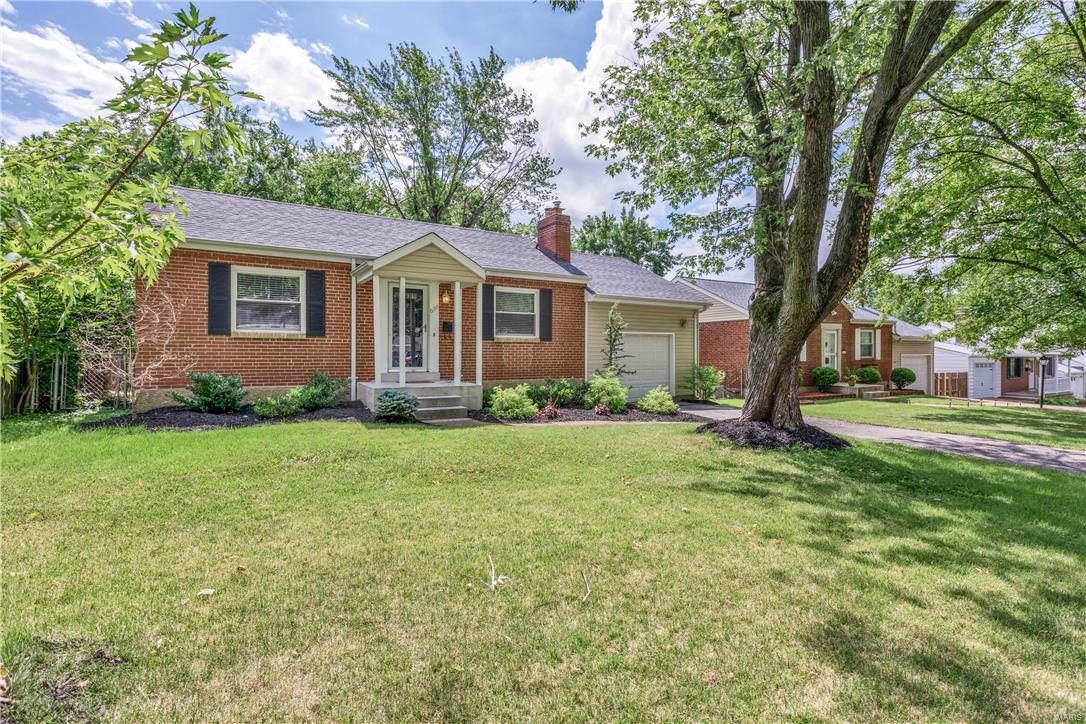 IMPRESSIVE!! Totally upgraded ranch located in sought after Webster Groves! Situated on a great level lot, this home will surly impress anyone that steps inside! Interior features: Spacious living room with gleaming hardwood floors that continue to both bedrooms. Functional floor plan, neutral paint, and an updated kitchen complete with 42 inch cabinets with crown molding, quality stainless appliances, travertine backsplash, granite countertops & beautiful tile floors! Separate dining room with large windows allowing for tons of natural light. Partially finished LL with additional living space that could be used as bedrooms or office space. Outside you'll find beautiful landscaping a huge deck overlooking the level backyard with plenty of room for the entire family to enjoy. Other features include newer windows, roof, siding, & HVAC systems.  Quick access to I-44, major shopping/entertainment, including downtown Webster Groves, just minutes from your front door!