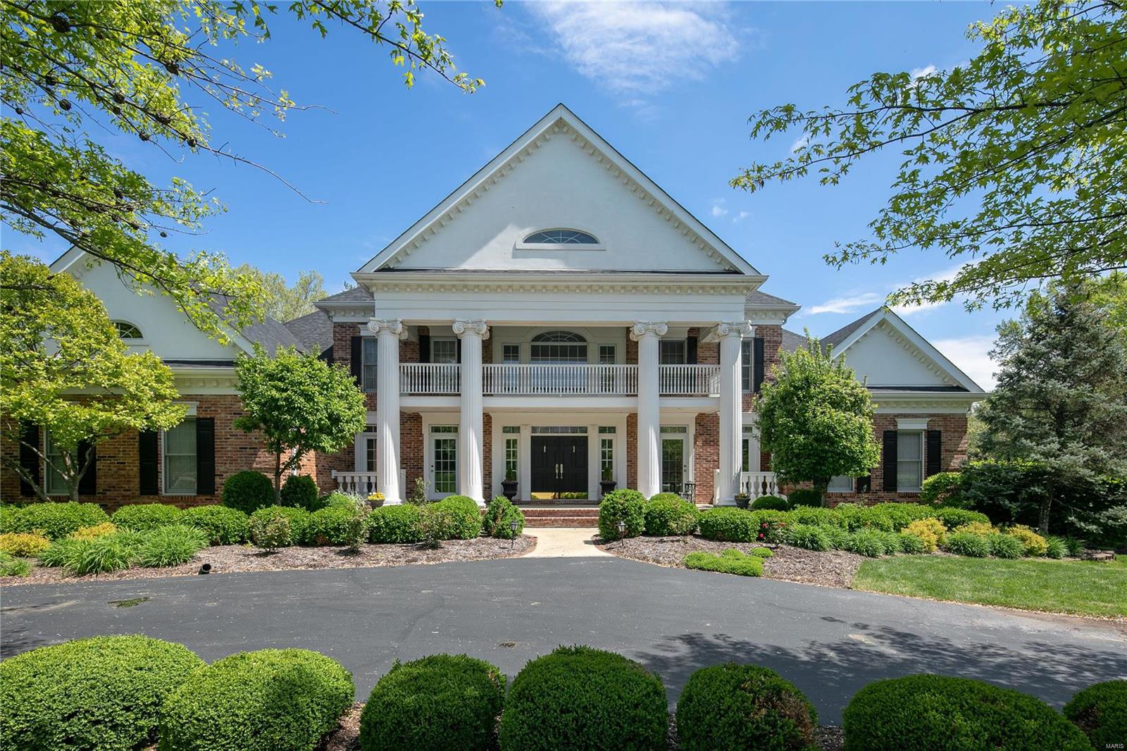 Superb craftsmanship and elegance define this incredible 1.5 story home. The stunning 2-story foyer has arched openings with detailed wood work. The formal dining rm features double French doors leading to the front patio. An office features incredible built-ins and rich wood paneling. The 2 story grt rm has soaring arched windows, a fireplace & built-ins. The master retreat features a coffee bar, sitting rm, and fireplace leading to the glorious bathroom. A cheery kitchen with high-end appliances and cabinets opens to the brkfst rm & hrth rm. The upper level features generous sized bedrms and baths. The lower level has a rec rm, fam rm, media rm, spa, exercise and bdrm. Enjoy the outdoors in the park-like lot which backis to mature woods and features a gorgeous in-ground pool.