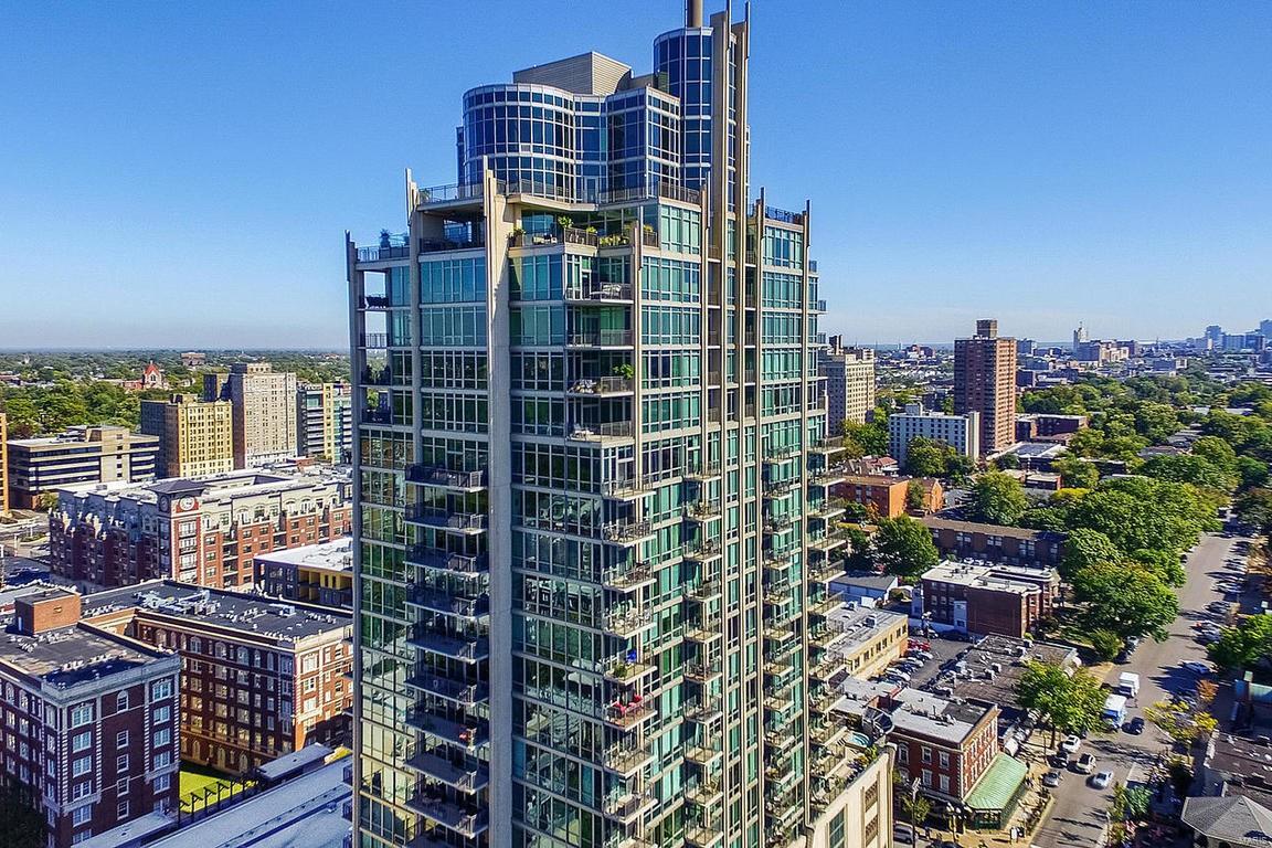 The views from the 21st floor showcase the City of St. Louis and the heart of the CWE. The all glass exterior walls are 10’ tall for
spectacular views from the kitchen, dining area, living room or the outside balcony. You can watch the sun come up in the morning to greet you while you are enjoying your coffee on the balcony or inside on your cozy sofa. The condo has a walk in pantry, powder room with new toilet, ample guest coat closet, and laundry room all of these are off of the hallway. Each bedroom is a suite with a full bathroom and walk in closet. The master bathroom was upgraded in 2015 see the Feature Sheet for details. The second bedroom has a Murphy bed for overnight guests and is used as a home office. The unit has 2 parking spaces #15 & #16 on 3rd floor; Storage locker #88 & #87 in the garage and storage space #82 on the first floor. The 7th floor has the amenities of a pool, spa, Community Room, Fitness Center and Hotel Room for rent to residents for short term guests. Location: City, Corner Location, Upper Level