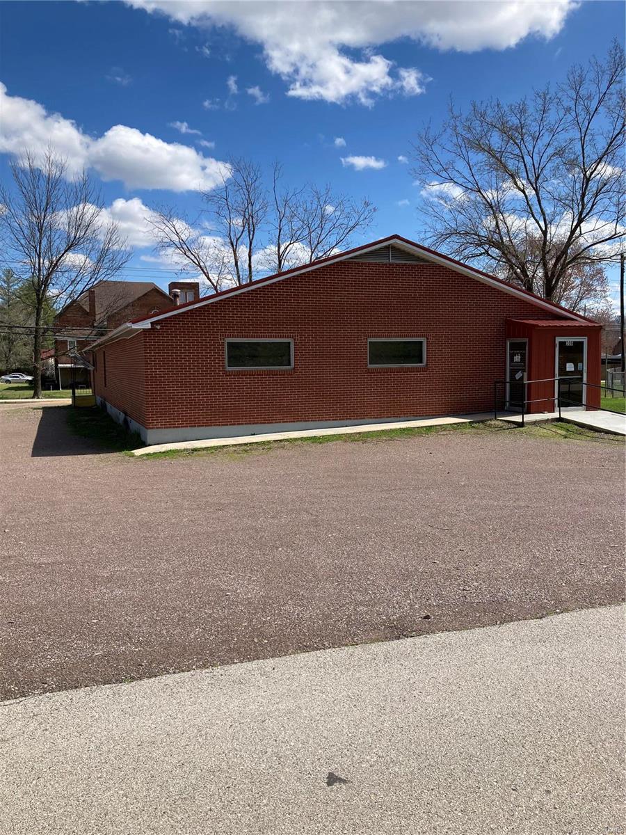 Commercial building located in Piedmont. Brick exterior with a metal roof. Formerly used as a Family Counseling Center, with several offices and large meeting rooms, that has 4050 sq ft. Currently the building is vacant, with many possibilities for use in the future. Large parking area with entrances from two streets. Location: City, Downtown