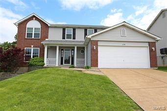 UPDATED 4+BR/4BA 2-STORY! Enter to foyer w/half bath; wood floors & crown moldings extend from foyer into dining room. SPECTACULAR kitchen is adjacent w/white cabinets, S/S appliances, granite counters, 6' long center island, & 2 large pantries. TWO huge windows allow tons of natural light & overlook the large, fenced backyard. Spacious breakfast room boasts a bay window & access to 20x18 patio. Both rooms are open to the 20x15 great room w/WB fireplace, built in bookcases, & oversize bay window. Utility/mud room is nearby w/access to attached 2-car oversize garage. Master Suite is upstairs w/fabulous master bath, cathedral ceiling, & walk-in closet. Three more bedrooms & full hall bath round out upper level. Lower level boasts 3rd full bath, office/sleeping room, + terrific 33x12 family entertainment room. Adjacent 10x7 bar area is complete w/9' long oak-topped bar, TWO wine refrigerators, sink, & granite-topped backbar w/storage. GREAT FOR ENTERTAINING(MAN CAVE) OR TEENAGE HANGOUT!
