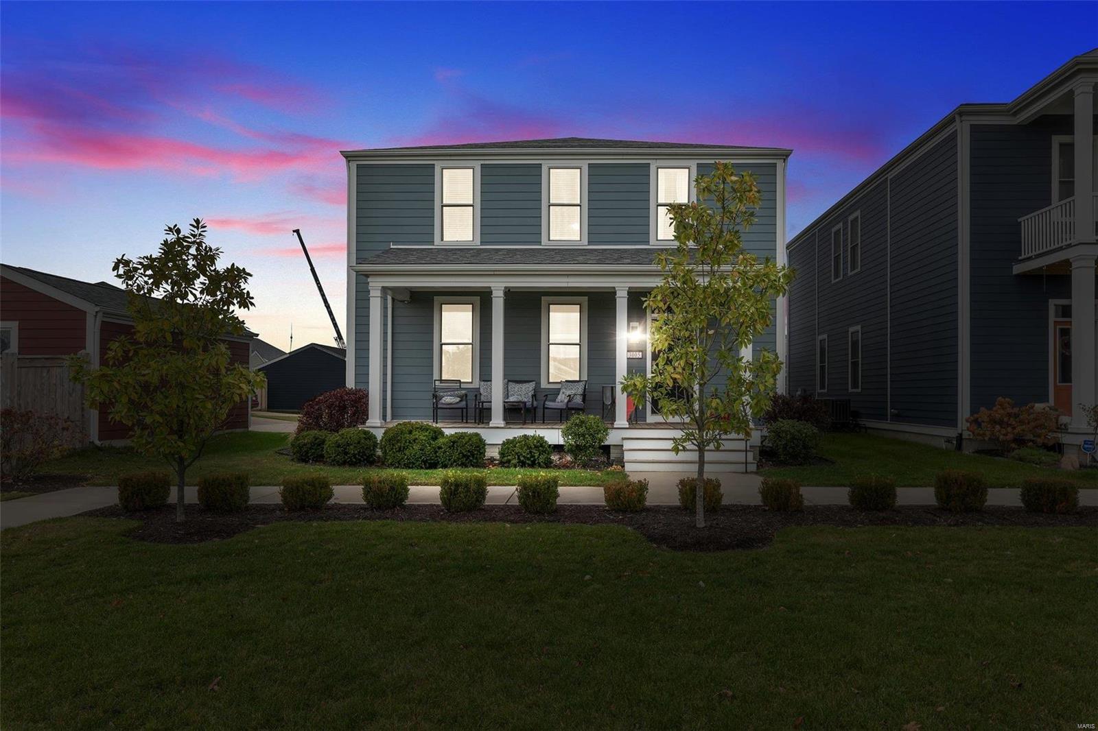 Welcome Home to this AMAZING 4 bed 2.5 bath 2 story home w/2 car garage and fenced in back yard, located in the Beach District of New Town with common ground in the front of the home and a playground! Greeting you w/a covered front porch, upon entering the entry foyer welcomes you to the large spacious open and entertaining floor plan! The main level offers tons of natural sun light, beautiful engineered wood flooring throughout! Kitchen offers tons of cabinet, countertop space, built out pantry w/Custom Elfa closet organizing system, center island w/breakfast bar! Main floor laundry and a half bath. Upstairs you will find spacious bedrooms w/ceilings fan & decent closet space with wire shelving, the Master bedroom suite offers a huge closet with Custom Elfa closet organizing system. Full hall bathroom upstairs offers double sink vanity! Lower level is ready for your finishing touches with a full bathroom rough in and egress window! This one has tons of upgrades!