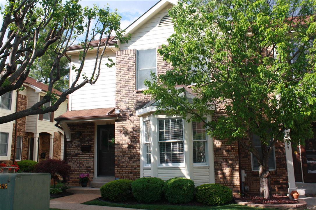 Gorgeous 3 bedroom, 2.5 bath, end unit townhouse with 3 floors! Living room with bay window, neutral carpet and plenty of space. Main level family room/hearth room has fireplace with gas logs. Master bedroom suite has a generous walk in closet and full bath. Updated kitchen with granite countertops, tile backsplash, ceramic tile flooring, built-in microwave and atrium door walking out to private deck.  Lower level rec room! 2 assigned parking spaces. Location: End Unit