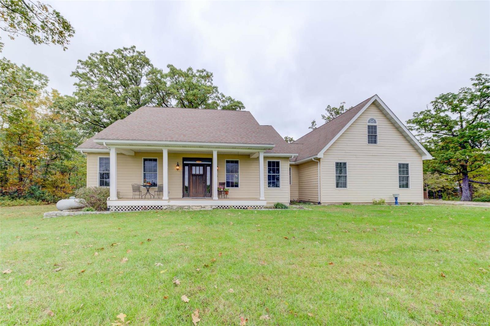 Showings begin Thursday 10-28-2021...STUNNING COUNTRY SETTING boasts beautiful family home situated on 5.5 acres.  Large front porch invites you IN or just to sit and relax end enjoy the views.
Welcoming entry features open floor plan with soaring ceilings and wood flooring throughout the main level.  Kitchen offers grand island, stainless appliances and plenty of cabinets with additional counter space.
Cozy up in the spacious Great Room with vaulted ceiling and woodturning stone fireplace.
3 bedrooms to include Master bedroom with en suite complete the main level.
Additional space upstairs with loft, bonus room, or office, your choice!
Partially finished lower level with full bath waiting for your finishing touches.
Oversized 2 car garage, shed or outbuilding provides the finishing touch!!!
Lets not forget 5.5 acres to play Hide and Seek...Don't miss this one!!!