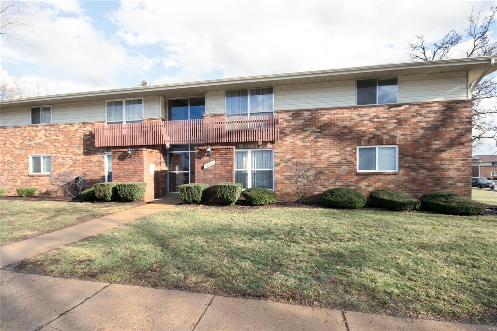 Tremendous Value for spectacular condo w/$22,000 recent premium upgrades in High-Rated Pattonville Schools! Incredibly impressive 2 bedroom ground level garden unit w/welcoming newer concrete patio/updated wood privacy fence, RARE private laundry in unit, personal storage locker LL plus Complex swimming pool & abundant green space. Move-in ready, impeccably clean, well-maintained condo boasts amazing list of fantastic improvements... nothing to do but move in & ENJOY. Stunning 42" rich maple kitchen cabinets w/crown & dental molding, built-in desk/computer cabinet/pantry, stainless appliances Incl refrig, faux granite counters, track-lighting; Fresh paint, crown molding/window casing, 6-panel interior/front drs, plush neutral carpet, diagonal-laid ceramic tile kitchen/dining rm/bath; Striking bath w/deluxe granite top vanity/shower w/dual seats; Updated light fixtures/ceiling fans/basebrds, energy efficient thermal windows/slid dr, A/C condenser. Why rent when you can buy for less? Location: End Unit, Ground Level, Suburban