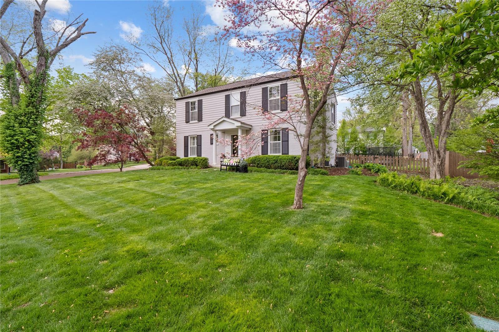 A short walk to everything Clayton has to offer from this charming yet sophisticated Ladue home. From the moment you enter this tastefully appointed open floor plan, you'll fall in love. The ideal home for entertaining! The center hall entry leads to living room with gas fireplace, built ins & French doors open to lovely patio & yard. Bay window in the dining room adds space. Kitchen & family room of your dreams! Subzero refrig, Wolf gas stove, center island, ice maker, wine cooler, beverage cooler, coffee bar, butler area & more! Kitchen opens to large, homey family room with w/b fireplace. Three sets of French doors leading to patio area make for a bright & airy space. Powder room, mud room & laundry room complete the 1st floor. 5 bedrooms & 4 bathrooms up. Primary bedroom & well-appointed bathroom with double vanities, large shower. Adjoining is a fabulous room with separate entrance from garage now used as office & fitness room. The ll includes rec room, office, bathroom & storage. Additional Rooms: Mud Room