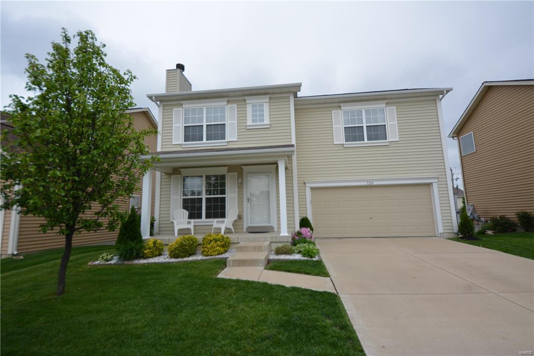 WELCOME HOME! Charming, clean & MOVE-IN-READY! Pride of ownership shows in this 3BR 2.5BTH 2sty w/1530+ SF of living space that shows like a display. Exterior boasts GREAT curb appeal w/lush landscaping, newer roof, covered porch & 2 car garage. Walking in you'll notice the spacious living rm featuring a WB fireplace. You'll love the bright & open kitchen w/custom cabinetry, center island, bkft bar, tile backsplash, new SS appliances (ALL INCLUDED), pantry & bkft rm w/slider to deck overlooking the fenced backyard, perfect for outdoor entertaining & enjoyment. The upper lvl master suite presents a large walk-in closet & private full BTH. 2 add'l BR, full BTH, & laundry (WASHER & DRYER INCLUDED) on upper lvl. The clean walk-out LL w/rough-in for BTH is just waiting for your custom finish for added living space. The desirable Countryshire subdivision offers community pool & tennis courts. Great Location w/easy access to major HWYs, top rated Wentzville schools, restaurants & shopping.