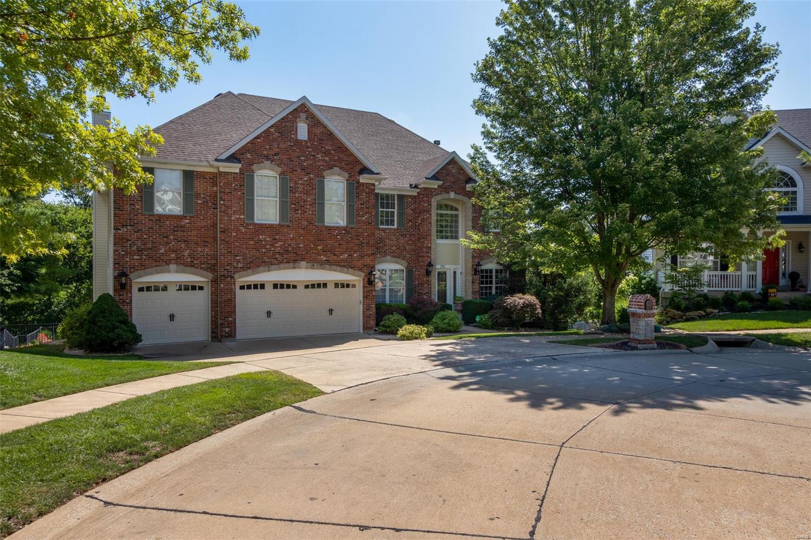 NEW PRICE! This custom built home has a POOL! 5 bedroom home sits on .46 ac lot that backs to a beautiful wooded secluded area.  The main floor includes 2 fireplaces, entry foyer, living room, kitchen, family room, hearth room and kitchen/dining area as well as a formal dining room.  The walkout lower level includes a theatre room, exercise room & reception area and 5th bedroom, bath and wet bar.  The upper level with a large open loft room and 4 bedrooms and baths.  This 
upper level master bedroom includes a gas fireplace and many amenities. The back yard
has a unbelievable custom in ground salt swimming pool and  custom patio area that includes a speakers system for your listening pleasure.  This home is located in a friendly
community consisting of 19 homes.