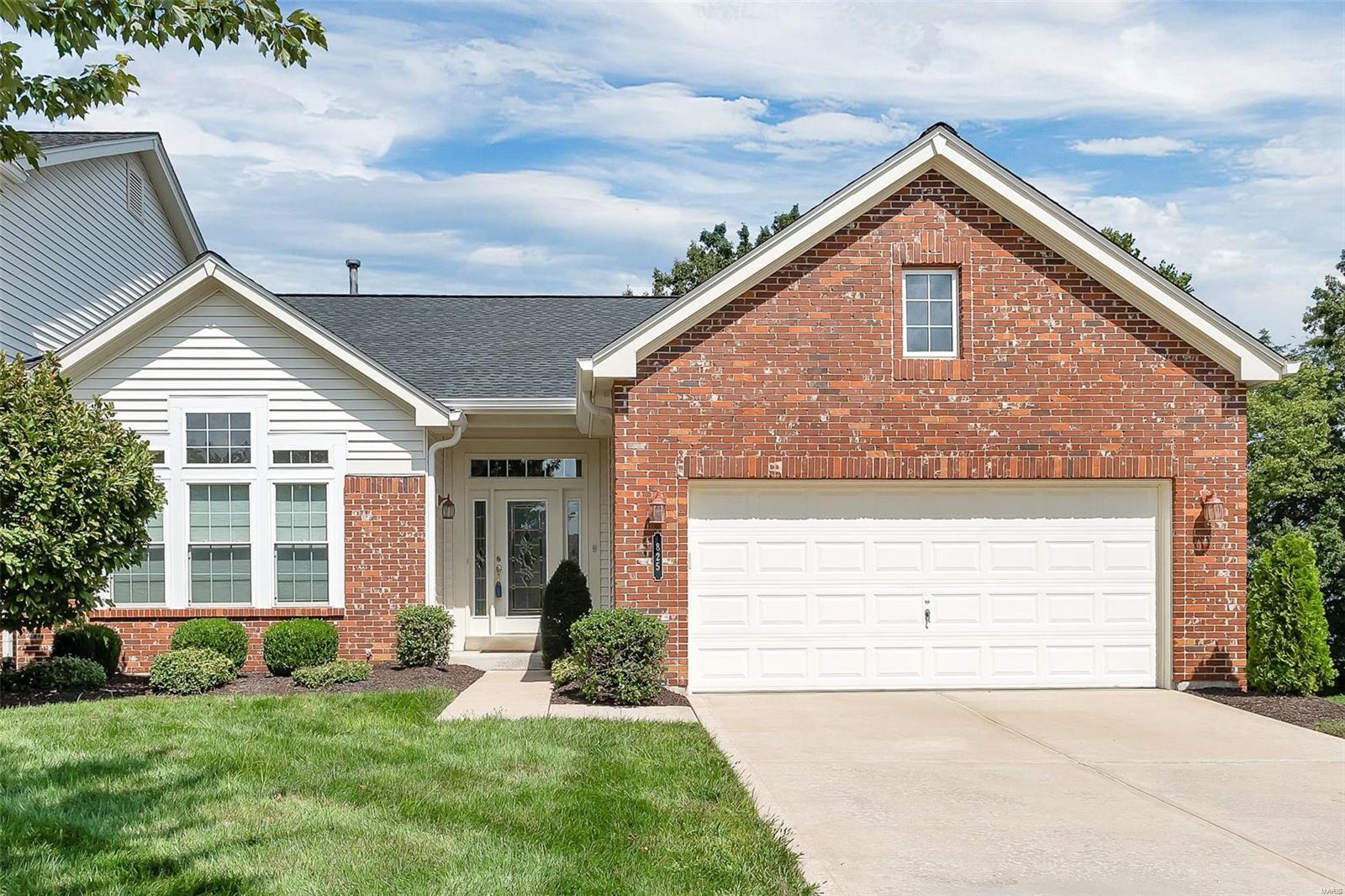 Lovely Lake Saint Louis area with all of the nearby shopping & restaurants not to mention this villa has Lake Rights with boating, fishing, swimming! This well maintained villa offers over 1600 sq ft on the main level plus nicely finished walk out lower level to include open family rm w/Blt in bookcases, 3rd bedrm & 3rd full bath! 9' ceiling thruout main level + taller pour lower level. Step thru leaded glass front door at entry into Great Rm featuring gas FP. Separate dining rm adjoins - perfect for those Holiday gatherings! Spacious kitchen features 42" cabinetry, blt-in over & micro + DW & smooth top downdraft Jennaire cooktop! SS Maytag refrig negot! Plenty of extra storage added in eat in kitchen.Tiled backsplash! Main Floor Laundry off kitchen. Main level master suite offers view of common ground thru bay window. Private bath has separate soaking tub, shower, DBL bowl vanity & walk-in closet. Vaulted 2nd bedrm/office w/transom windows for lots of natural lighting! Newer roof! Location: End Unit, Ground Level