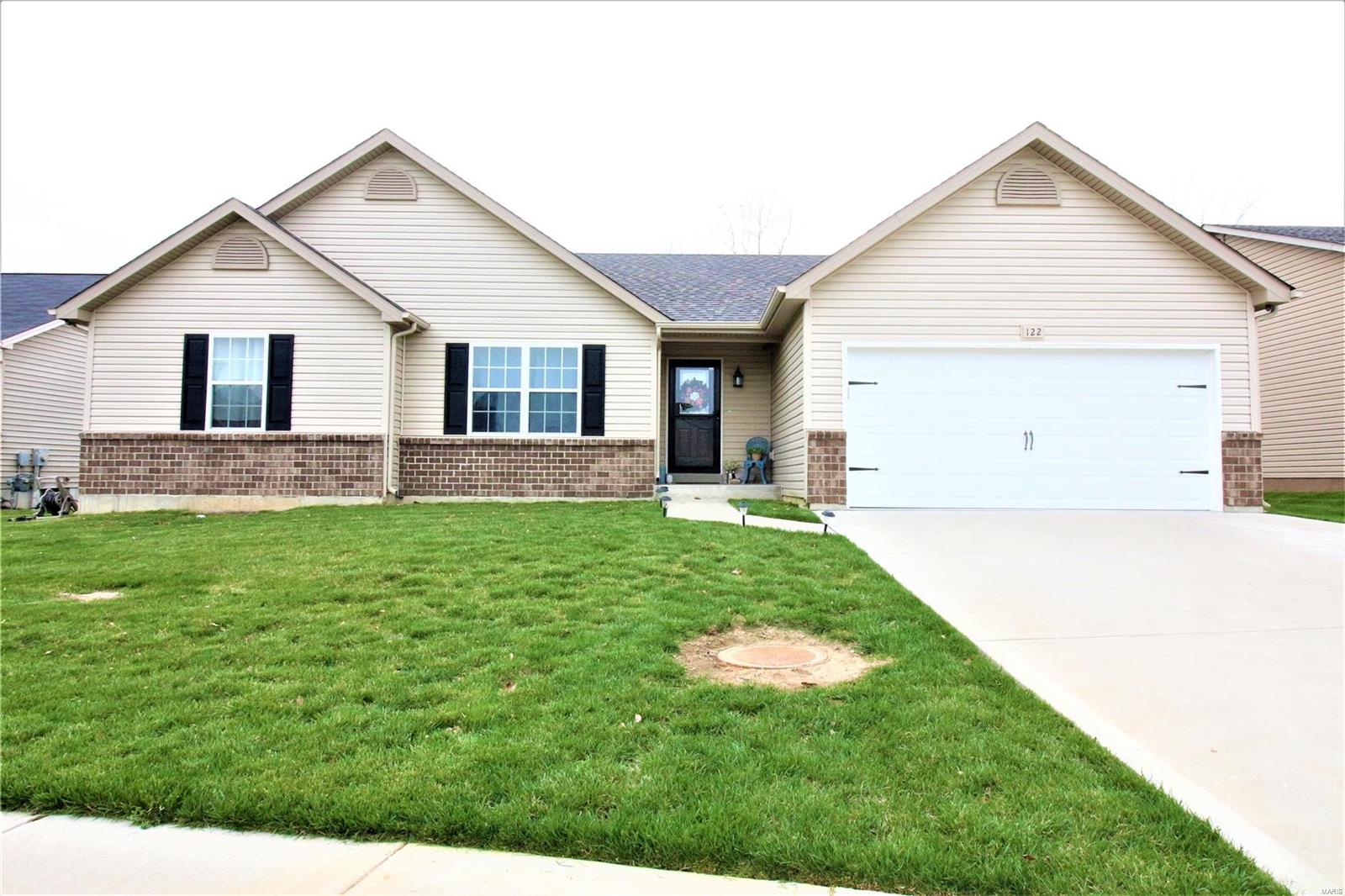 This three bedroom, two bath open concept ranch is sure to impress. The great room features a vaulted ceiling and plenty of window space to bring in natural light. The kitchen features beautiful staggered custom cabinetry and granite counter tops. Step out onto the patio which offers plenty of room for entertaining guests. The master bedroom features a walk-in closet and luxury master bathroom including a double bowl vanity, shower and separate bath tub. Tasteful paint and oil rubbed bronze fixtures throughout make for an aesthetically pleasing place to call home. Being built in 2016, this home is in great condition and will serve as a great place to make memories for years to come. Great neighborhood and exceptionally rated Wentzville School District. Listing agent is owner.