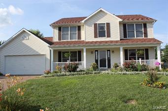 GORGEOUS move-in ready, well-maintained home with significant updates! Fantastic location on a large lot and quiet cul-de-sac in the very popular Villages of Dardenne.  Large eat-in kitchen with sliding glass door to oversized patio, center island, granite countertops, newer stainless steel appliances.  Kitchen opens into the spacious family room with wood-burning fireplace and bay window showcasing the large and beautifully landscaped backyard. Formal dining room for entertaining and office/den with french doors and great natural light.  2nd level has huge open loft area and 4 bedrooms, all with BRAND NEW CARPETING, master bath with double vanity, corner tub, shower and walk-in closet.  Finished basement with family and rec rooms, sleeping area, ½ bath.  Oversized 2-car garage.  NEW ROOF IN 2012, NEW CARPET 2014, NEW KITCHEN FLOOR 2014, NEW APPLIANCES, NEW NEUTRAL PAINT THROUGHOUT. Subdivision amenities: 3 pools, golf course, clubhouse, lakes, tennis courts. You won’t be disappointed!