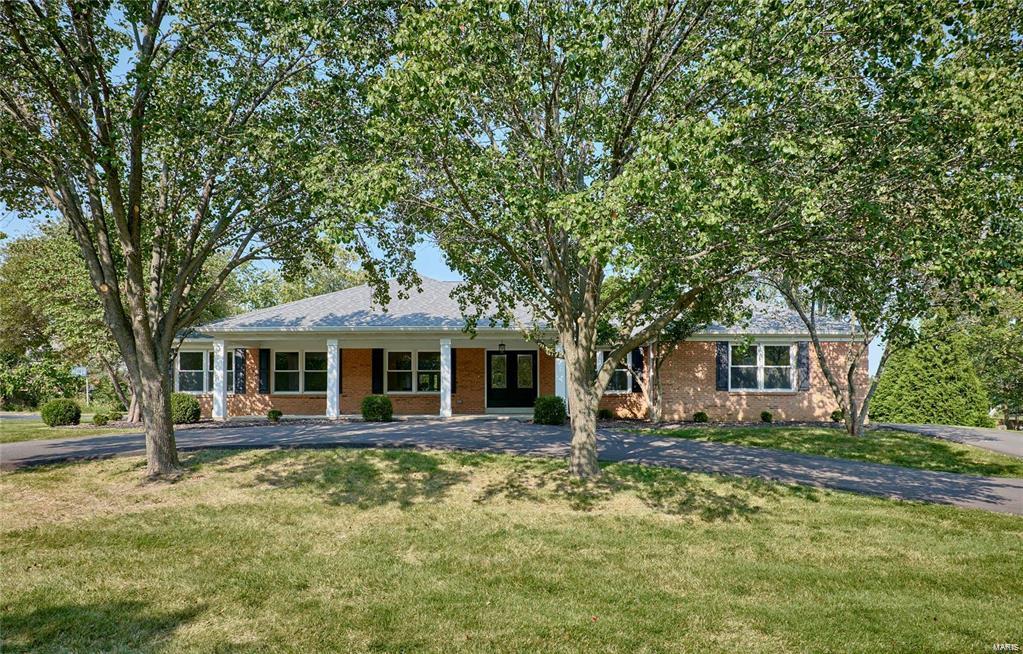 Welcome to this beautifully updated 4 Bed, 4 Bath Ladue home, where modern elegance meets comfortable living. Gorgeous all brick ranch with extra large porch, circle drive & back garage entry. Kitchen & Bath Updates, Freshly painted interior & new flooring throughout. Grand foyer entry flows into Living & Dining Rooms. LR open to huge, vaulted Great Room & walks out to large patio &  level backyard. GR also opens to Breakfast room/Kitchen featuring sleek, quartz countertops, lovely backsplash, center island w/ breakfast bar, SS appliances & walk-in pantry. ML open Primary Suite w/ walk-in closet & room for a sitting area. Primary Bath offers new double vanity & fixtures. 3 add'l bedrooms on ML are well-sized w/ new Full hall bath. Partially finished LL family room or rec area, updated half bath plus add'l space for home gym/play area. This beautiful home is near all of St. Louis's amazing amenities, including Grant’s Farm, The Magic House, The Zoo & more! Stop by today!