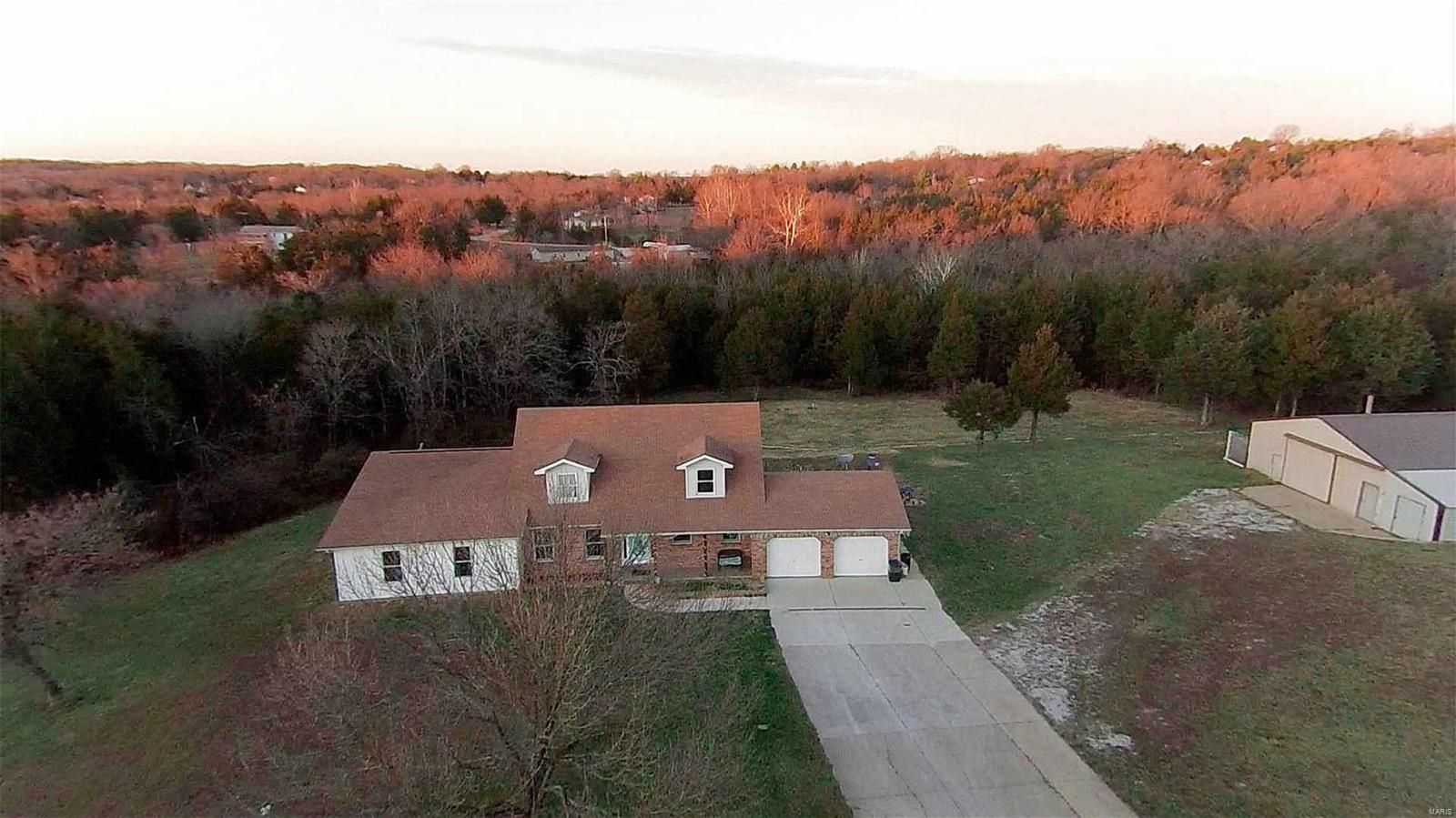 Amazing 5 bedroom 4 bathroom all electric home on almost 6 level acres. This home overlooks the vineyard of LaChance winery! Brand new septic installed in 2019 . 30X60 Pole barn with and additional room with electric installed!! Solid surface counter tops, center island, beautiful flooring found throughout this home!!! Have it all in this home!!!