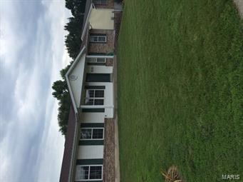 Awesome ranch home on great, corner lot.  This home has many updates including newer carpeting and laminate wood flooring.  Spacious kitchen with pantry and sliding doors leading the large, deck.  Updated bathroom and some lighting.  The lower level is finished with family room and updated bath.  There's an extra room with possible sleeping or office.  The walk out leads to patio.  There's also a bar for entertaining.  The exterior is nearly maintenance free with vinyl siding, enclosed soffits/fascia with a gorgeous brick front.  The garage is side entry and oversized with opener and attached cabinets to stay.  Convenient location in Seckman School!
