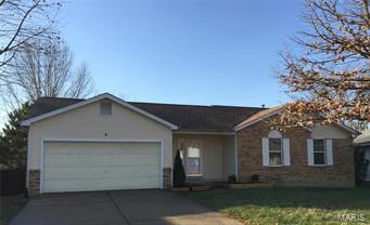 Welcome home! This thoroughly updated home is move-in ready & located just 1 mile from the Hwy K & 364 intersection for easy access to everywhere. Kitchen boasts GRANITE COUNTERTOPS, brand NEW STAINLESS APPLIANCES, ceramic tile flooring, and freshly painted cabinetry. Master suite has large walk in closet and the master bath comes with a double vanity with granite top, JACUZZI TUB, separate shower, and its own closet. Other bedrooms are large too. The walkout basement features a large rec room, bedroom with large closet, half bath, another large room for good measure, and a workshop. Level backyard has wood privacy fence and a freshly stained huge deck (32'x16'). NEW WINDOWS! NEW HVAC SYSTEM! New water heater! New carpet throughout and freshly painted walls/ceilings/trim. All baths, entry foyer, and the kitchen/breakfast nook have ceramic tile. New lighting and brush nickel knobs/hinges throughout. 2200sqft of living space! Architectural shingle roof. House backs to Hwy N.  Don't wait!