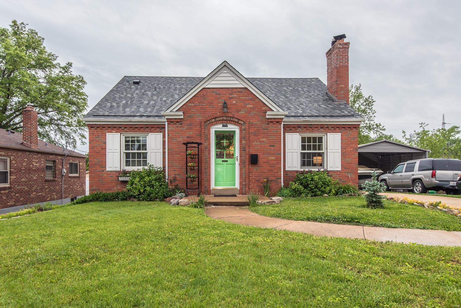 You have to see this to believe it! If you want an ENORMOUS master suite & garage this is your dream home! Updated 3 bed, 1.5 story all brick home features coved ceilings, refinished hardwood floors and beautiful original woodwork & doors. It has newer Marvin thermal insulated windows with blinds. The living room includes a wood burning fireplace & stained glass windows. There are two beautiful built-in cabinets in the dining room. The kitchen has been completely updated w/ 42 inch cabinets, Bosch dishwasher, Amana stove and refrigerator, ceramic tile flooring, and travertine backsplash. Boasts completely renovated bathroom, sunroom with beautiful new porcelain tile flooring & a sliding glass door which leads to backyard & patio, main floor bedroom w/ his & hers closets, new driveway, garage, newer PVC stack, copper plumbing, newer 200amp electric service.  Garage is 24x24 with 13' clearance!

 One block from family friendly 9 mile garden!  Enjoy food trucks, movies, music and more! Additional Rooms: Sun Room