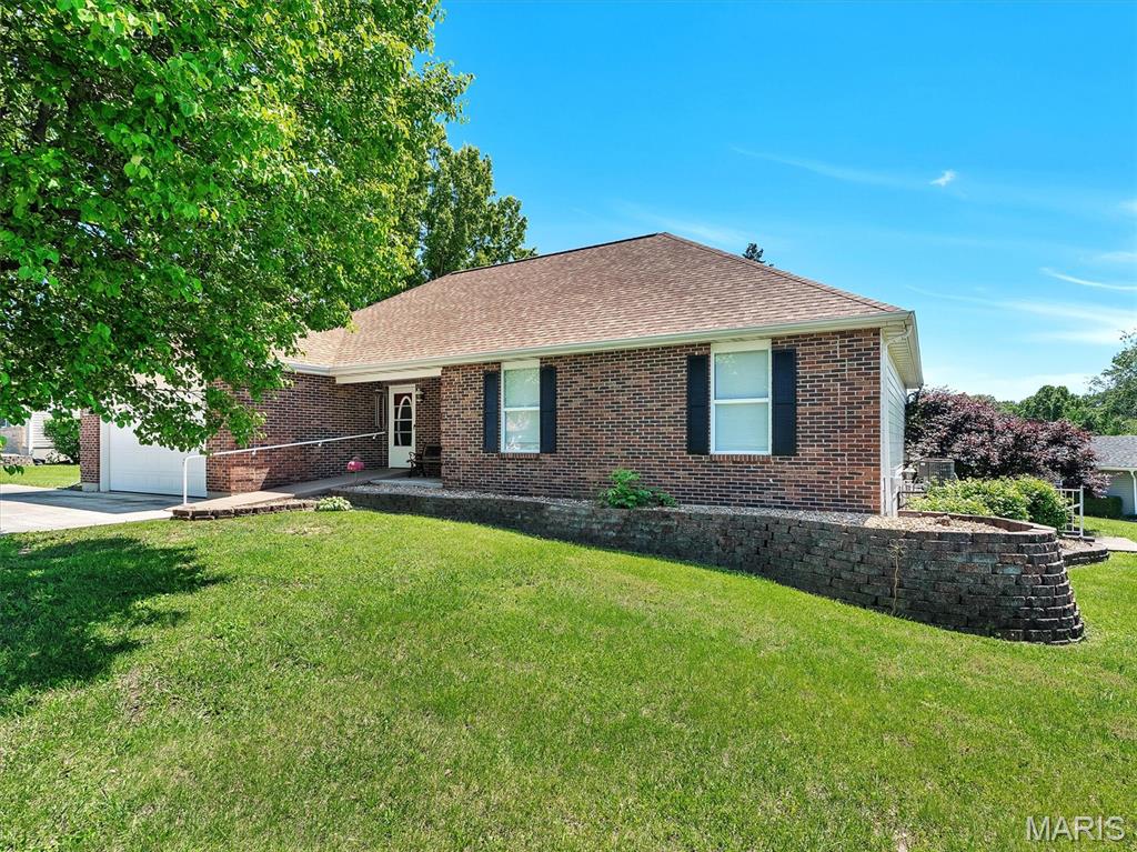 Welcome home to this beautifully maintained ranch in Pine Lake Estates, a peaceful community with a pool and scenic pond, less than a mile from I-44 and HWY 100. This 3-bedroom, 3-bath home offers 2,615 sq ft of flexible living space with an open floor plan, vaulted ceilings with skylights, and a tray ceiling in the primary suite. The kitchen features a breakfast bar with seating, pantry, and eat-in dining - all flowing seamlessly into the main living area anchored by a gas fireplace. 

The primary suite includes an en suite bath. Two additional bedrooms, a second full bath, and main floor laundry round out the main level. Head downstairs to the partially finished lower level where entertaining is effortless with a full wet bar, gas fireplace, full bathroom, a bonus room, and walkout access; plus an additional unfinished space with a deep utility sink. 

New roof in 2022. Samsung panel-ready refrigerator conveys. Step outside and enjoy summer without leaving home - the subdivision pool sits directly adjacent to your backyard with peaceful pond views just beyond. Attached 2-car garage completes this incredible package. Don't miss it! 

Listing agent is a licensed Missouri real estate agent and owner of the property.