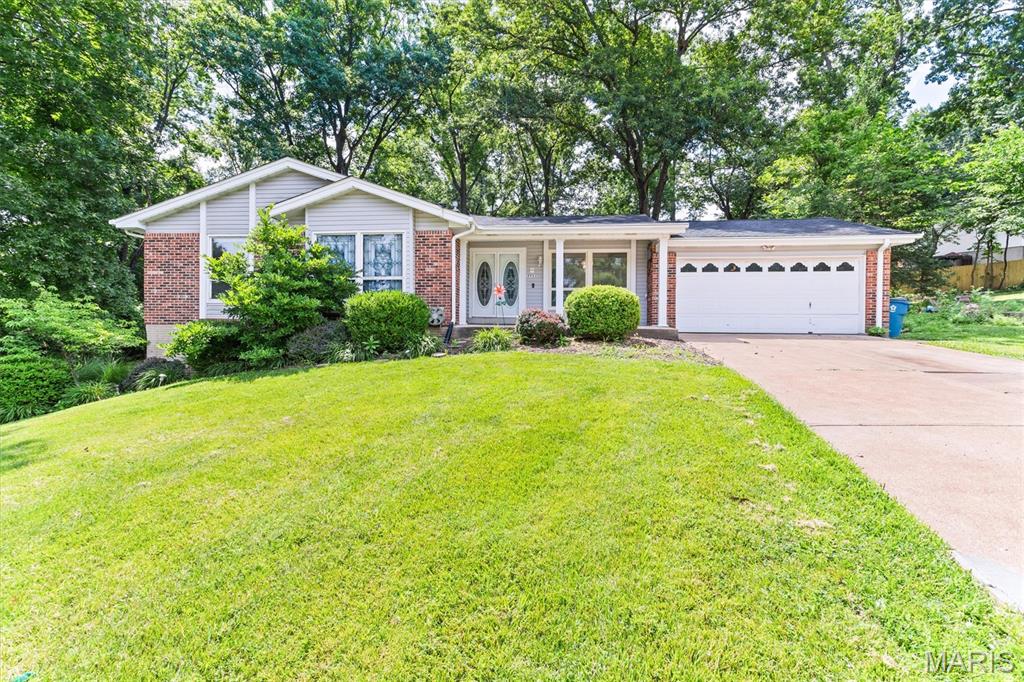 Incredible Spacious Custom Ranch home with over 4000 sq ft of living space.  Main level 2500 plus Lower Level 1500.  This home boasts a welcoming presence the moment you walk in.  The main level has Entry Foyer, Dining room, Theater Room,  Hearth Room/Breakfast room, Kitchen, Greatroom, Primary Bedroom, Primary bath, secondary bedrooms, hall bath, bar room, main floor laundry.  Lower Level has rec room, family room, utility room, full bath, Workshop, Storage Area, and walk out.  
Exterior Features include architectural roof, vinyl siding, enclosed soffits, gutter guards, large deck, 2 sheds, partially fenced.  All on .41 acres backing to trees. 
Interior features include custom molding, custom 42 inch cabinets, granite countertops, custom buffet, three (3) fireplaces, walk in closets, coffered ceiling in the dining room, recessed lighting, pantry, vaulted ceiling, sliding doors, ceiling fans, stainless steel appliances, and so much more.  
Items to stay include the theater room chairs, theater room equipment and Kitchen refrigerator.
This home is so much more than what words can describe.  Once you step in you will be amazed at the space!  Come check it out!!