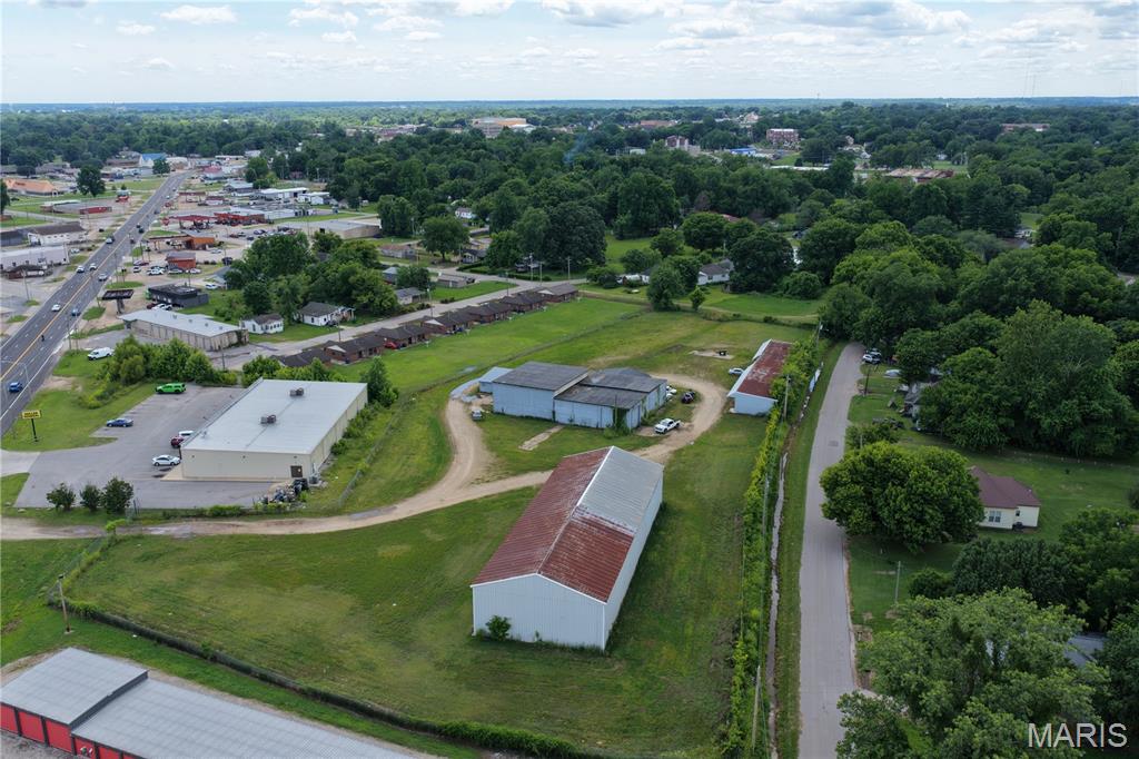This excellent commercial property is located in Poplar Bluff, along business highway 60. The property is in a high traffic location, with excellent highway visibility. The property consist of multiple shops and outbuildings, making it ideal for automotive, warehouse, storage, or a variety of other commercial uses. All utilities are onsite, creating endless possibilities. If you are looking for a commercial property, in an amazing location, then this is a must-see! Call today to schedule your own private tour.