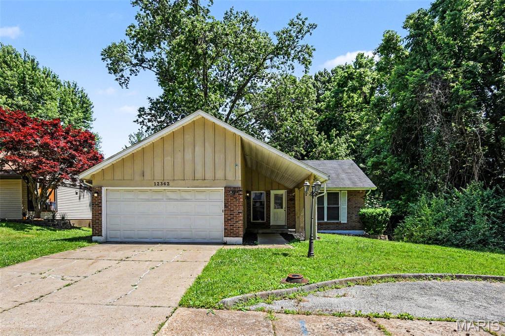 Come and see this beautiful 4-bedroom, 2.5-bathroom home, which offers a perfect blend of comfort and style in the highly desirable Trail Woods neighborhood!
The heart of the home flows directly into an inviting kitchen outfitted with striking black appliances and practical laminate countertops. Designed with a smart split layout, the spacious primary bedroom serves as a quiet retreat, complete with a large walk-in closet and a private, dedicated primary bathroom. Located in a quiet cul-de-sac, you can find a better lot. 
Perfectly situated, this prime location offers an easy commute to major St. Louis employment hubs, local schools, and nearby parks and recreation. Schedule your private showing today!