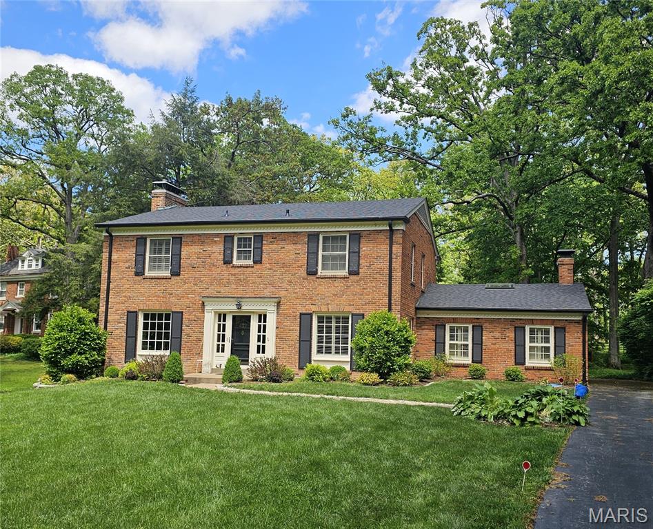 2 story Brick home with partially finished lower level and sun room added on.  2 car detached garage.   New Roof.   Home needs cosmetic updating throughout.  
Entered for Comp purposes.
