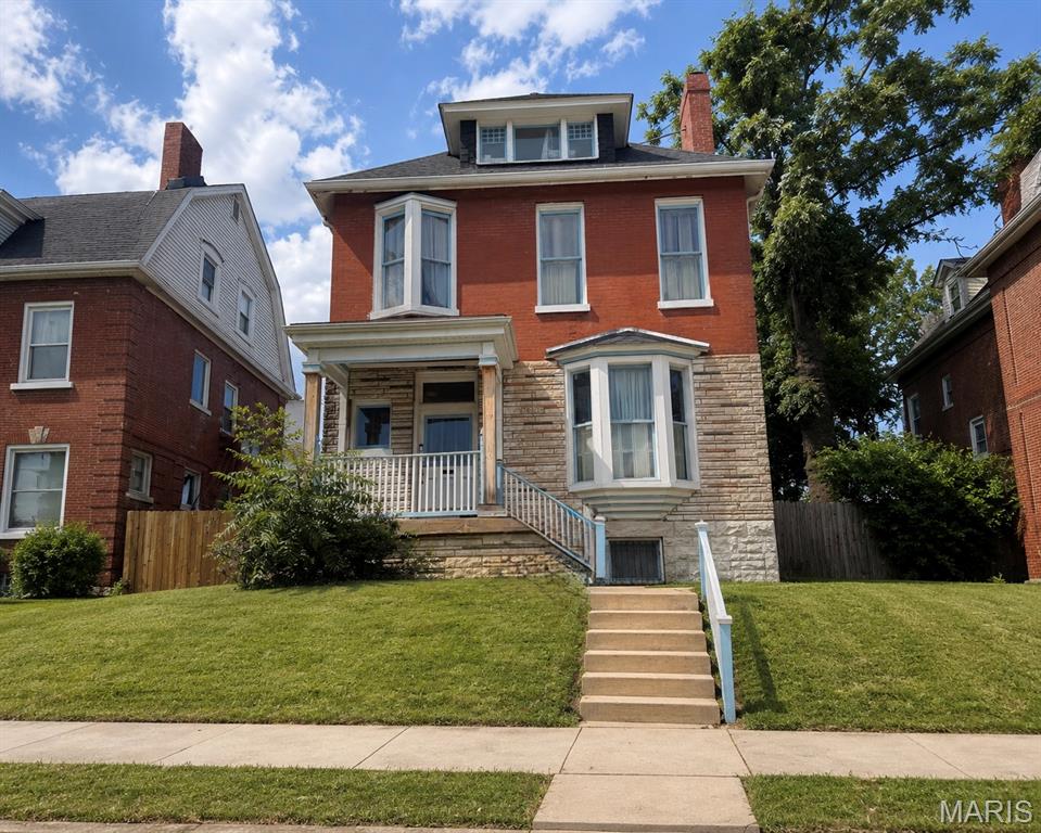 Historic brick 2.5-level Craftsman-era home with impressive scale, timeless character, and major recent updates already completed. They do not build homes like this anymore. This property offers spacious rooms, hardwood floors, rich wood trim, tall paneled doors, wide casings, transom-style details, multiple fireplaces, large windows, and a strong historic St. Louis presence throughout. Just minutes from area hospitals (Barnes-Jewish, Children's, Forest Park and SSM Cardinal-Glennon to name a few), Universities, all St. Louis major attractions, Interstates, Malls, Restaurants, Parks, Public transportation.

Although the home is being sold strictly AS-IS, Sellers have made meaningful improvements and lovingly maintained key systems over the years. Roof replaced May 2025. New furnace installed in 2023, second furnace installed in 2025, and HVAC systems have been regularly maintained by Anton’s, with last service completed April 2026. Dishwasher replaced in 2025. Deck expanded in 2017. Sewer addressed by City of St Louis Sewer Lateral Repair Program in 2025. This is the kind of home with great bones, character, and upside. It simply needs its next owner to bring fresh vision, cleanup, and TLC. Property is currently furnished and in the process of being cleaned out. Photos have been digitally edited to remove furniture, trash, and personal items to show the potential appearance once cleared. Property does not currently show exactly as pictured. Buyer to verify current condition in person.
Excellent opportunity for an investor, landlord, restoration buyer, or owner-occupant looking for a large character-filled home with important updates already in place. Sellers are motivated and ALL offers will be considered.