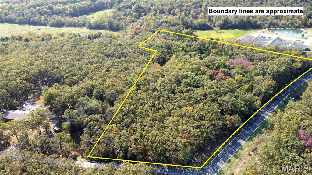 *Owner Financing Available* 
Located just north of Oak Grove Village at the northernmost Sullivan Exit, this 9 +/- acres is zoned C-4 General Commercial within the Sullivan City limits. Both city water and sewer are accessible. The land is fronted by Springfield Road and bordered to the south by "Victorian Place of Sullivan", a retirement facility. The land is less than a mile from HWW 44. 
The property consists of gently rolling terrain with a mixture of timber types. 
Per city code, "The "C-4" (general commercial) District is designed to accommodate the widest range of commercial activities." The tract is vacant and ready for extended development. 
*SELLER FINANCING AVAILABLE* Location: City