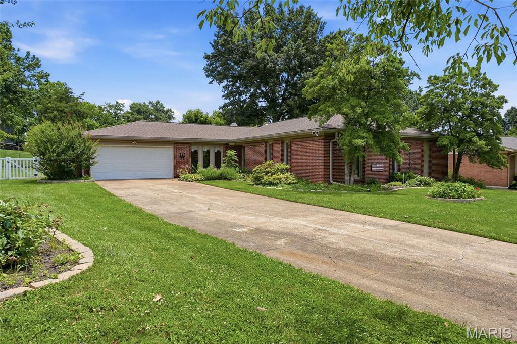 Welcome home to this spacious ranch nestled in a quiet, established Ballwin neighborhood! Offering 4+ bedrooms and 3 full bathrooms, this home provides an incredible opportunity for buyers seeking space, comfort, and convenience.

Step inside and discover a versatile floor plan featuring a welcoming living room, a cozy family room, and a formal dining room, perfect for everyday living and entertaining. The large kitchen offers abundant cabinet and counter space and opens to a bright breakfast room, creating the ideal gathering place for family and friends.

The spacious primary bedroom is a true suite, complete with a walk-in closet and a private full bathroom, providing a comfortable retreat at the end of the day. Additional bedrooms offer flexibility for family, guests, a home office, or hobbies.

The convenience continues with main-floor laundry, a finished large lower level, and a generously sized two-car garage. With multiple living areas and flexible bedroom space, there is plenty of room to fit a variety of lifestyles.

Enjoy an unbeatable location within walking distance of an aquatic park, beautiful parks, and golf courses, providing endless opportunities for recreation and outdoor enjoyment. Whether you're looking to move right in, update to your personal style, or invest in a home with tremendous potential, this property is a wonderful opportunity you won't want to miss.

Conveniently located near shopping, dining, schools, and major commuter routes, this Ballwin ranch combines space, location, and value in one exceptional package. Schedule your showing today!