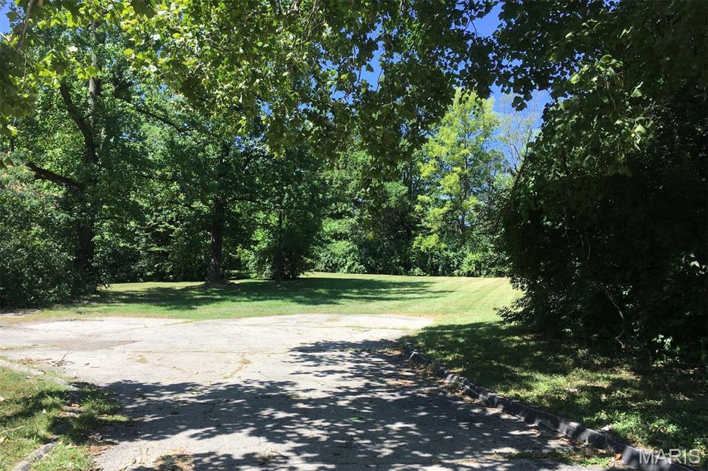 This lot is being sold with the adjacent lot at 18 Sona Lane which is included in the sale price. Both lots total 1.4724 acres. Prime location for multi-family condo development. Will need to be rezoned. Great Creve Coeur location. Ladue schools. Zoning Change Req'd
