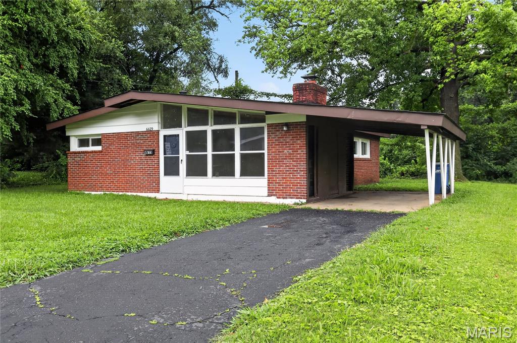 Discover the inviting charm of 6619 Graybirch DR, STLS MO 63134, a single-family residence built in 1954, ready for you to move in. This property offers a perfect blend of classic appeal and modern comfort, providing an ideal setting for everyday living. This home features three comfortable bedrooms, each offering a peaceful retreat. The single bathroom is thoughtfully designed, providing essential functionality. A dedicated laundry room adds convenience to daily routines. The attached carport offers practical shelter for your vehicle.