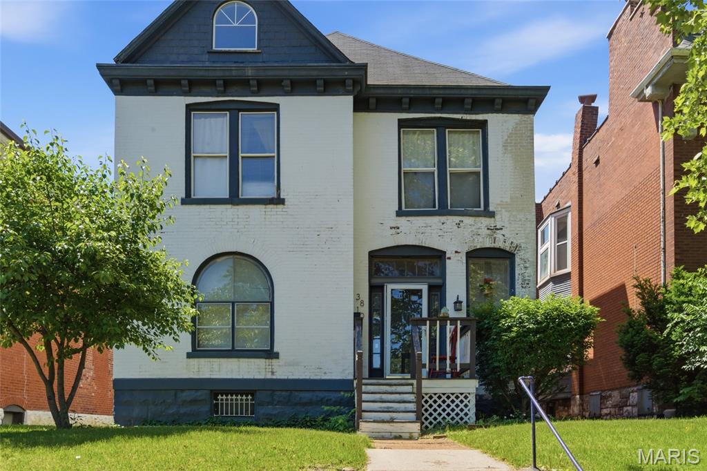 So much potential in this historic brick home on a spacious lot in the heart of Tower Grove South, one of the city's most vibrant and well loved neighborhoods.  Wouldn't it be amazing to have Tower Grove Park in your front yard?  And just a short walk to local restaurants, coffee shops, boutiques and a farmer's market!  The first floor of this home has a large living room, dining room, kitchen and 1/2 bath.  On the second floor, you will find three generously sized bedrooms, a full bath and great views of the park!  The third floor offers a primary suite with full bath.  A full, dry, walk-up basement offers endless possibilities for additional living space and plenty of storage.  The large, fenced backyard leads to the oversized 1 car garage with alley access. Updates include 220amp electric panel, some PVC plumbing and new hot water heater in 2025.