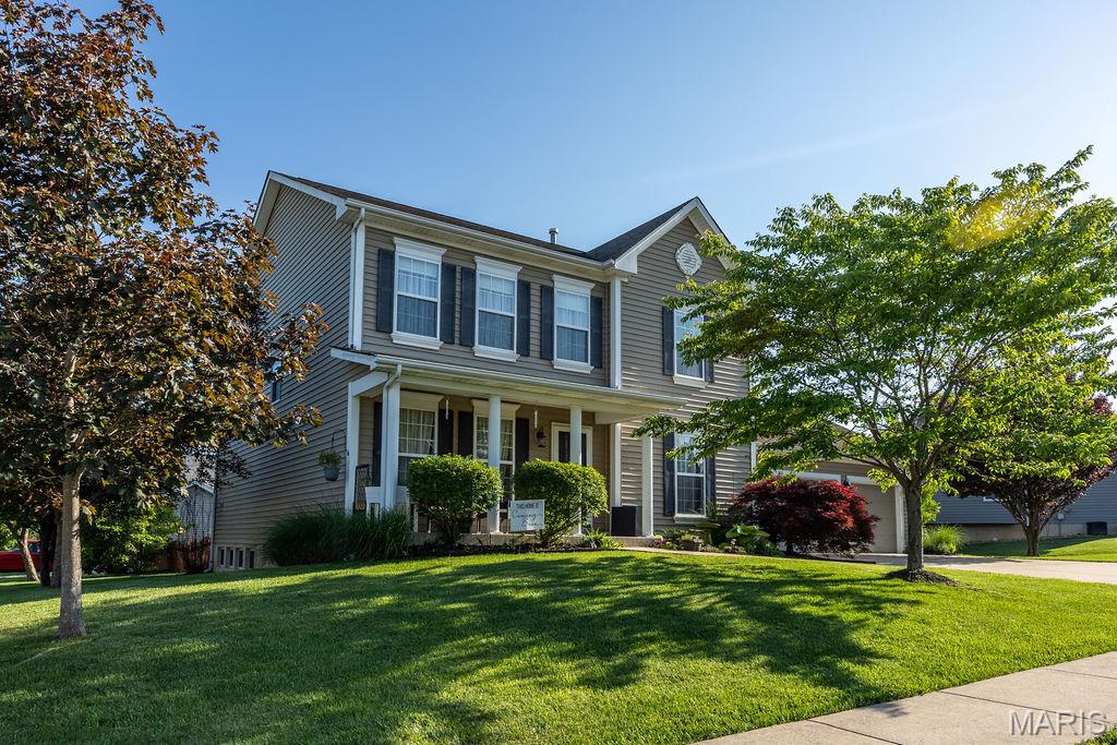 You won’t want to miss this 2-story home on a desirable corner lot in Wentzville offering 4 beds, 3 baths, and a functional open layout. The main level features an open concept living room/kitchen with granite counter tops, stainless appliances, breakfast bar, and pantry. Separate dining and sitting room off the main entrance add versatility. Upper level includes a large master bedroom with walk-in closet and private bath plus three additional bedrooms all with walk-in closets. Partially finished lower level provides additional recreation space and ample storage. Fenced backyard, concrete outdoor patio, and oversized 3-car garage. Convenient location near schools, shopping, and major highway access.