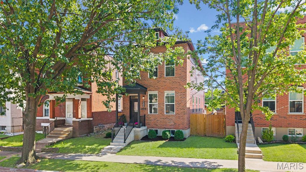 Super clean, modern, 2023 construction house next St. Louis University's Medical Center, right between major highways 44 & 64!! Stunning curb appeal with a brick façade, covered entryway and fresh landscaping. As you walk in, the main level has a bright, wide open floor-plan with tall ceilings & windows, hardwood floors and a beautifully crisp white kitchen & quartz island between two inviting living spaces. An abundance of white cabinets, counter space & fresh stainless steel appliances support your daily cooking and entertaining!! Upstairs, the master suite has a tray ceiling, a gorgeous black & white, dual vanity bathroom with a separate bathtub & tiled shower, walk-in closet & a private deck. Two more bedrooms, another tiled full bathroom & laundry room complete the second level. The huge, 9-foot pour basement is waiting for your finishing touches! Outside the back of the house is your two-level deck, a private fenced-in yard perfect for kids & pets and a massive carport to protect your cars. This is everything you need in a house! Low maintenance, newer systems, newer EVERYTHING. Move-in ready & very short distance to restaurants, cafes, Starbucks, Target & Top Golf. Incredible city location within the Gate neighborhood. Tax abatement until 2036! This represents around $38,000 in property tax savings in the next decade!! THIS IS the insanely good deal you do not want to pass on!