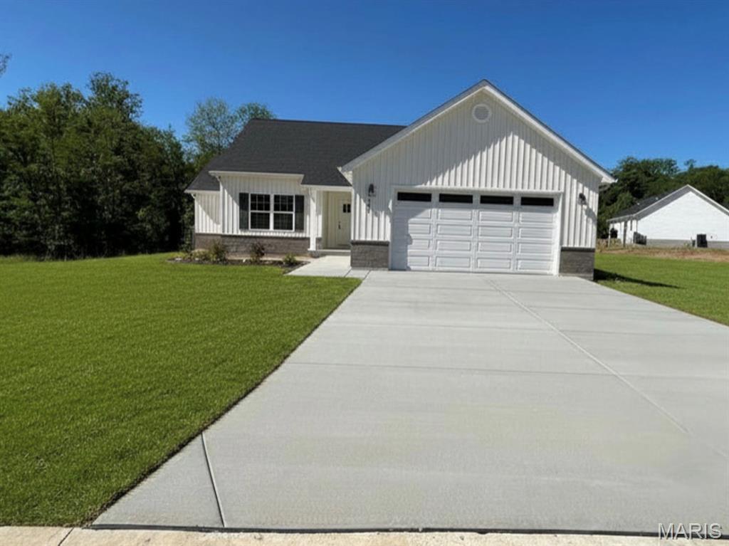 Under Construction! 

This stunning and spacious ranch home is nestled in a private lake community. Designed with an open-concept layout, it features 3 bedrooms, 2 bathrooms, a large laundry room, and a mudroom with built-in storage. The kitchen boasts custom cabinetry, quartz countertops, a stylish tile backsplash, a large island, and flows seamlessly into the great room. The primary suite offers a private retreat with a luxurious bathroom and ample closet space.

Enjoy engineered hardwood flooring in the kitchen, great room, laundry room, and hallways, with LVT in the bathrooms and plush carpet in the bedrooms. The basement includes a rough-in for a potential third bathroom. Estimated completion June 2026.

Located less than 10 minutes from Interstate 44, this home also offers exclusive access to a breathtaking 6-acre lake!