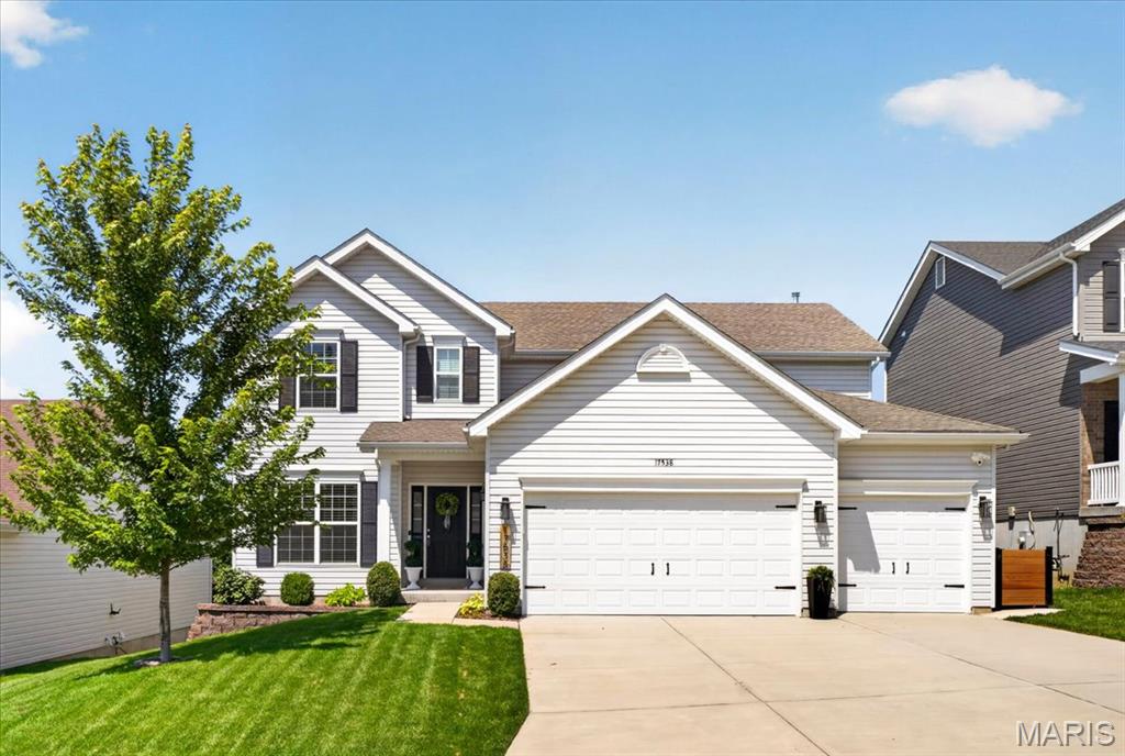 Pride of ownership shines throughout this beautifully maintained, just 5-year-young home! Designed with today's lifestyle in mind, the bright, open floor plan offers effortless flow for everyday living and entertaining.
The spacious family room is filled with natural light and overlooks the private, tree-lined backyard, creating a peaceful retreat. The impressive kitchen is the heart of the home, featuring an abundance of cabinetry, a massive center island, a walk-in pantry, and plenty of workspace for cooking and gathering. The adjoining breakfast room is enhanced by a custom dry bar, adding both style and extra storage. A custom drop zone keeps everyone organized, while the convenient main-floor laundry is located just off the garage. The charming powder room completes the main level.
Need flexible living space? The formal dining room is currently being used as a playroom and home office, offering endless possibilities to fit your lifestyle.
Upstairs, you'll find a spacious loft that's perfect for flex space. The expansive primary suite features a large walk-in closet and a luxurious en-suite bath with dual vanities, a soaking tub, separate shower, and generous storage. Three additional spacious bedrooms and a well-appointed full bath provide room for everyone.
The walk-out lower level is ready for your finishing touches, offering endless potential for additional living space, a home gym, or recreation area.
Step outside to your own private oasis! The fully fenced backyard backs to common ground and mature trees, providing exceptional privacy and beautiful views year-round. Enjoy morning coffee or evening gatherings on the composite deck, complete with a brand-new remote-controlled awning for shade and comfort.
Ideally located near schools, shopping, dining, and major commuter routes, this move-in-ready home truly has it all. Simply unpack and start enjoying everything it has to offer!