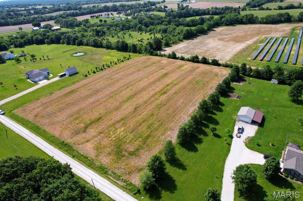 4.22-Acre undeveloped flat and cleared property perfect for your dream home build with detached building. Located just 10 minutes from I-70 in a quite established development close to black top road. Property is currently in a farming agreement. Buyer shall agree not to disturb land and/or farming operations until current crop can be harvested.