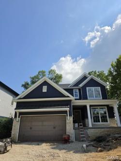 New Construction, 2-story, 5 bedroom, 3.5 bath by Schindler Homes LLC in Kirkwood. This beautiful home features 9' first floor ceilings, hardwood flooring entire 1st floor, wainscot trim in den, stainless steel Kitchen-Aid appliances with chimney hood, 42 inch shaker kitchen wall cabinets with soft close drawers and doors, pull out trash cabinet, under cabinet lighting with light rail, walk-in pantry, quartz countertops, mudroom on 1st floor with custom lockers, fireplace in family room, luxurious master bath with double sinks, Moen plumbing fixtures, separate tub and shower, his and hers large walk-in closets, large 2nd floor laundry with cabinets/granite folding counter, 50 gallon hot water heater, cased out windows, tall pour and finished lower level, and architectural grade shingles. Will have fully sodded yard and professionally landscaped. Great location, convenient to highways, parks, and shopping. Projected July finish date.