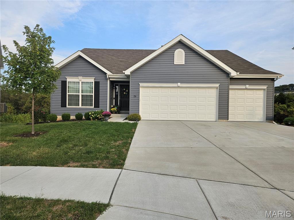 Why wait for your dream home to be build when this like new and meticulously maintained MAPLE EXPANDED could be yours today. It's listed under market value and ready for a new family to call it home! It has 3-bedrooms and 2 baths and comes with golf course like views with lots of privacy. THIS IS A MUST SEE! It boasts 42" custom cabinetry, quartz counter tops, a large kitchen island with plenty of seating, custom lighting, wood spindled staircase and stunning wood laminate flooring which extends throughout the main floor. The natural light floods in through the 6' windows into the vaulted oversized great room and kitchen. The sunrise views from the back of the house are breathtaking. The oversized primary bedroom is a dream, along with the spacious walk in closet and large luxury en-suite which includes soaking tub, double vanities with wave bowl sinks, enclosed water closet and walk-in shower with bench. Primary bedroom is braced and wired for a ceiling fan. The spacious walkout basement has a full rough-in for a future bathroom as well as plenty of storage and hang out/workout room. The walkout sliding doors lead to the large, private and level fenced in backyard with patio and gazebo for relaxing and entertaining. Home comes with a 10-year builders warranty.