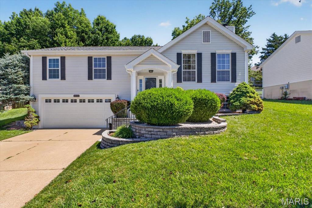 Welcome to this stunning, impeccably maintained split foyer that blends style, space, and comfort! Offering 4 bedrooms, 3 full bathrooms, and a 2-car garage, this move-in-ready home features an open-concept design with soaring vaulted ceilings and abundant natural light throughout. The spacious kitchen is perfect for cooking, entertaining, and gathering with family and friends.
Beautiful hardwood floors flow through the main living areas, complemented by updated bathrooms and recent improvements including a newer roof and siding for added peace of mind. Step outside to your private retreat featuring a patio and a large, fully fenced backyard—ideal for entertaining, pets, play, or simply relaxing in privacy.