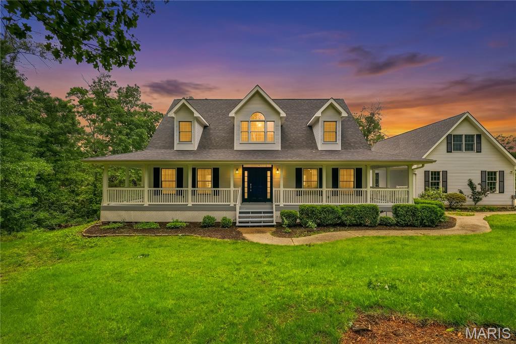 Beautiful 1.5 Story Home set on 9 Acres. Main Level Owner's Suite has a Large Bedroom with Crown Moldings and a private deck area, Walk in Closet with built in organizers, Bath features a huge walk in tile shower with a bench, Double Sink Quartz top Vanity and tile floor. Eat in Kitchen with plenty of storage and counter space. Dining room with lots of Windows and light. Entry Foyer and Great Room both feature a High Cathedral Ceiling. The great Room has a floor to ceiling Stone Wood Burning Fireplace. Two more Bedrooms upstairs each with 3 closets. The Finished Lower Level has a family/game room, a kitchenette/bar, guest bedroom, a full bath and a walkout to a patio near the pool. Outside the house there is a wrap around deck with a covered breezeway to the oversized 3 car garage. Over the garage is a heated/cooled Bonus Room. Off the Great Room there is a screened in 3 Season Room. There is a 50' by 60' Outbuilding with concrete floor, large heated heated/cooled hobby area and a one horse stall with hay storage above. Behind the outbuilding you will find a Two stall horse barn with a tack area and hay loft along with an acre fenced off. Two stocked ponds. An orchard with apple, peach, plum, pear and apricot trees that are about 8 years old. Recent improvements include a new roof, 2 new HVAC systems for the house, Outside wood burning boiler heating system, new HVAC system installed in the outbuilding workshop, deck repairs and stain, new trim and doors, new paint throughout Horse Barn and Fencing. A Wonderful Property with lots to Explore.