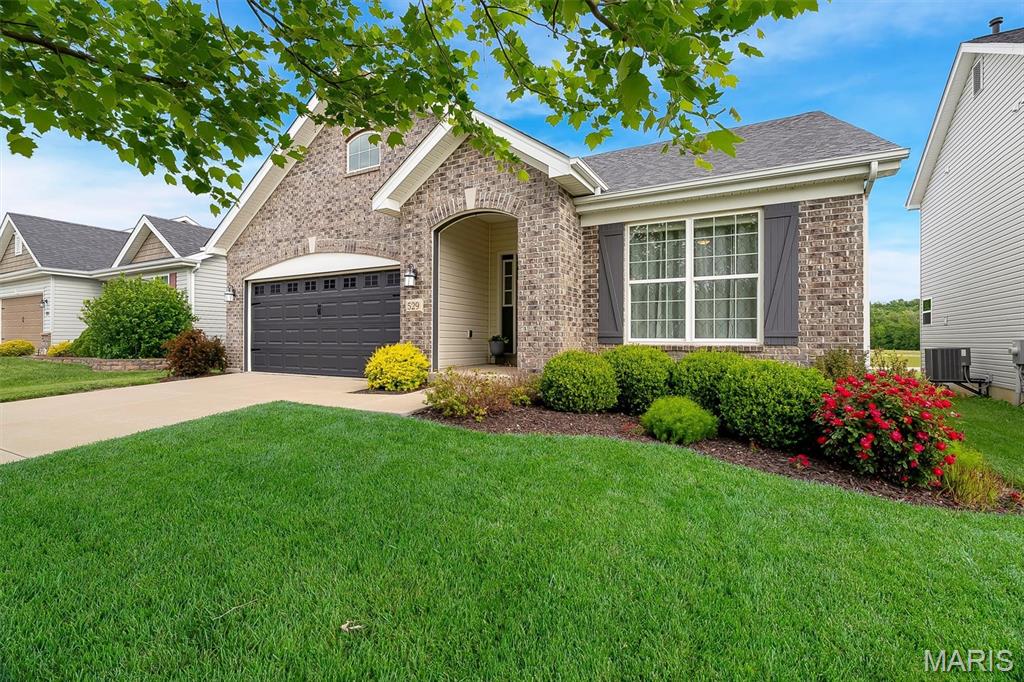 Welcome home to 529 Winding Bluffs Drive in Fenton, MO! This nearly new, meticulously maintained ranch blends timeless style with modern convenience. Featuring a low-maintenance brick and vinyl exterior, this move-in-ready home offers a great layout with three main-floor bedrooms, two full bathrooms, and an inviting living room with a cozy gas fireplace that flows into the dining area and beautiful kitchen. The partially finished lower level adds valuable living space with a fourth bedroom, rough-in for a full bath, and endless potential for a recreation room, home office, or guest suite. Enjoy the quiet, fenced backyard complete with a patio and pergola, perfect for relaxing or entertaining. Conveniently located near shopping, dining, schools, parks, and major commuter routes, this home offers the perfect combination of comfort, versatility, and location. Information pulled from various sources. Buyer to verify all MLS data.
